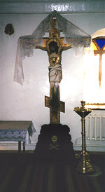 Crucifex with skull and crossbones